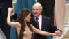  Miss Belarus 2018 Maryya Vasilevich and then Belarusian President Alyaksandr Lukashenka dance at a youth ball in Minsk, Belarus on December 28, 2018.