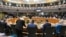 Officials sit in the meeting room during the European Council meeting at the EU headquarters in Brussels on December 19, 2024. (Photo by NICOLAS TUCAT / AFP)