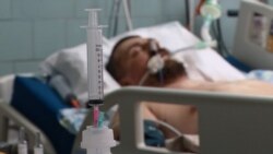 'It's Like A Military Field Hospital Here': Ukrainian Medics And Patients Speak Of COVID Trauma