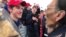 U.S. -- A student from Covington Catholic High School stands in front of Native American Vietnam veteran Nathan Phillips in Washington, U.S., in this still image from a January 18, 2019