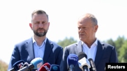 Владислав Косиняк-Камыш и Дональд Туск