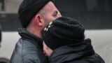 RUSSIA -- People grieve near a shopping center Zimnaya Vishnya in the West Siberian city of Kemerovo, March 25, 2018
