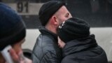 RUSSIA -- People grieve near a shopping center Zimnaya Vishnya in the West Siberian city of Kemerovo, March 25, 2018