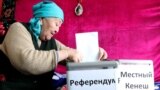 KYRGYZSTAN -- An elderly woman takes part in an early voting session in the village of Besh-Kungei near Bishkek, April 10, 2021