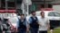 Japan - Police officers investigate near a facility for the disabled, where a deadly attack by a knife-wielding man took place, in Sagamihara, Kanagawa prefecture, Japan, July 26, 2016