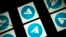 This picture taken on October 5, 2020 shows the logo of mobile messaging and call service telegram on a tablet screen in Toulouse, southwestern France.