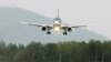 Russia -- Brand new Sukhoi Superjet 100 landing after its maiden flight. May 19, 2008. 