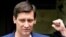 RUSSIA -- Dmitry Gudkov, opposition candidate for Moscow city council seat, spekas with reporters after leaving the Investigative Committee in Moscow, July 25, 2019