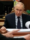 Владимир Путин на фоне растения, 6 декабря 2026 года