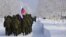 RUSSIA--KHABAROVSK TERRITORY / Soldiers march ahead of an individual race at a regional stage of the 2015 Tank Biathlon Competition at the Anastasyevsky training ground. Yuri Smityuk/TASS MARCH 3, 2015 