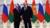 Владимир Путин и Александр Лукашенко перед встречей в Минске 19 декабря 2022 года