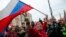 A supporter waves a Russian flag and shouts slogans during the April 21, 2021 rally in Moscow in support of jailed opposition leader Aleksei Navalny..