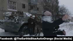 Still from Iryna Tsilyk's The Earth Is As Blue As An Orange (2020)
