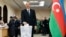 Azerbaijani President Ilham Aliyev casts his ballot at a Baku polling station during Azerbaijan's February 9, 2020 parliamentary elections.