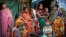BANGLADESH -- Rohingya Hindu refugees stand outside their make shift shelters at Kutupalong refugee camp near Cox's bazar, Bangladesh, Tuesday, Jan. 16, 2018. 