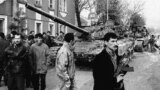 Tajikistan - Armoured vehicles of the presidential rapid reaction brigade under Colonel Makhmud Khudoiberdyev’s brigade in the streets of Tursunzade, 09Jan1997