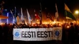 Tallinn, Estonia - People attend a torchlight procession organized by the far-right Estonian Conservative People's Party (EKRE) in Tallinn, Estonia February 24, 2019. REUTERS/Ints Kalnins