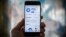 RUSSIA -- This illustration picture taken on April 6, 2018 in Moscow shows the Telegram messenger application displayed on the screen of a smartphone.