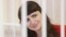BELARUS - Journalist Katerina Borisevich is seen inside a defendants' cage during a court hearing in Minsk, Belarus February 19, 2021