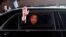 SOUTH KOREA -- North Korean leader Kim Jong Un (inside a vehicle) bids farewell to South Korean President Moon Jae-in as he leaves after a farewell ceremony at the truce village of Panmunjom inside the demilitarized zone separating the two Koreas, South K