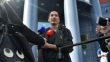 RUSSIA -- Computer programmer Aidar Gubaidulin, accused of attempted violence against a police officer during Moscow’s July 27 protest, speaks to journalists as he leaves a court in Moscow, September 18, 2019