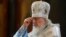RUSSIA -- Russian Patriarch Kirill crosses himself during an Annunciation liturgy at the Cathedral of Christ the Savior, in Moscow, April 7, 2021