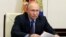 RUSSIA -- Russian President Vladimir Putin takes part in a ceremony launching the Amur gas processing plant managed by Gazprom company via video link outside Moscow, June 9, 2021
