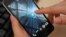 Russia -- Twitter icon is seen on a smartphone screen in Yekaterinburg, May 16, 2014