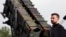 FILE PHOTO: Ukrainian President Volodymyr Zelenskiy visit to a military training area