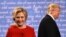 U.S. -- Democratic nominee Hillary Clinton (L) and Republican nominee Donald Trump leave the stage after the first presidential debate at Hofstra University in Hempstead, New York, September 26, 2016