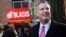 U.S. -- New York City Mayoral candidate Bill De Blasio speaks to campaign volunteers in a public housing village in the Queens borough of New York, November 4, 2013
