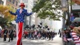 New York, U.S. - A man dressed as Uncle Sam reacts to a member of the crowd during the Veterans Day Parade in Manhattan