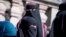 DENMARK -- Women wearing the niqab exit the Danish Parliament at Christiansborg Castle in Copenhagen, May 31, 2018