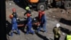 "Девчатки мои под завалами": потеряла на фронте мужа и еще не знает, что две дочери погибли от ракетного удара России по Киеву