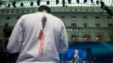 RUSSIA -- A volunteer in a shirt with the words that read 'Putin, volunteers of the headquarters' stands during Russian President Vladimir Putin's meeting with his supporters in Moscow, Russia, Tuesday, Jan. 30, 2018.