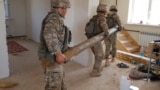 Kazakhstan – Sappers remove fragments of ammunition in Arys town. Turkestan region, 29June2019.