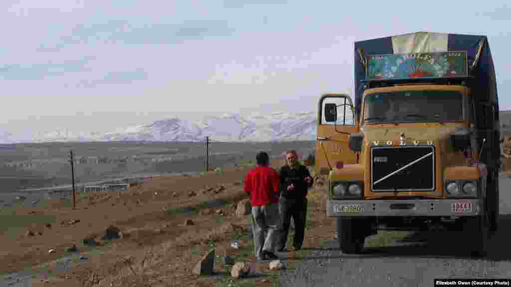 An ethnic Armenian truck driver from nearby Iran requests directions in 2006 from a taxi driver in the Lachin Corridor, a then-Armenian-controlled strip of territory that connects Nagorno-Karabakh to Armenia. On December 1, 2020, Azerbaijan will regain formal control of the Lachin district, but, under the new Armenian, Azerbaijani, and Russian peace deal,&nbsp; peacekeeping troops from Russia guard the Lachin Corridor.&nbsp;