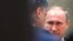 Belarus -- Ukrainian President Petro Poroshenko (L) and Russian President Vladimir Putin seen uring a meeting aimed at ending 10 months of fighting in Ukraine, Minsk, February 11, 2015