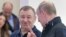 CRIMEA -- Russian President Vladimir Putin (R) speaks with Arkady Rotenberg as they attend the opening ceremony for a bridge linking the annexed Crimean Peninsula to Russia, in Kerch, May 15, 2018