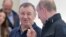 CRIMEA -- Russian President Vladimir Putin (R) speaks with Arkady Rotenberg as they attend the opening ceremony for a bridge linking the annexed Crimean Peninsula to Russia, in Kerch, May 15, 2018