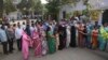 INDIA -- Indians stand in queues to cast their votes at a polling booth for the first phase of general elections, near Ghaziabad April 11, 2019