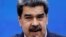 FILE PHOTO: Venezuela's President Nicolas Maduro addresses the media, in Caracas
