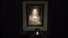 U.S. -- visitor takes a photo of the painting 'Salvator Mundi' by Leonardo da Vinci at Christie's New York Auction House, in New York, November 15, 2017