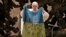 VATICAN – Pope Francis shows a flag that was brought to him from Bucha, Ukraine, during his weekly general audience in the Paul VI Hall, at the Vatican, April 6, 2022