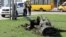 UKRAINE – A fragment of a Tochka-U missile with a writing in Russian "For children" , on a grass after Russian shelling at the railway station in Kramatorsk, April 8, 2022