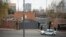 RUSSIA -- Security staff and Russian police car patrol the U.S. Embassy in Moscow, April 20, 2021
