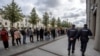 Russia -- People queue up to attend a protest in support of Russian actor Pavel Ustinov