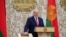 Belarusian President Alyaksandr Lukashenka takes the oath of office as president of Belarus during a swearing-in ceremony in Minsk on September 23, 2020. 