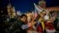 RUSSIA -- Fans take selfies in the Red Square after Russia defeated Spain in their round of 16 match at the 2018 soccer World Cup in Moscow, July 1, 2018