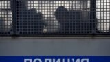 RUSSIA -- Silhouettes of detained people are seen in a police truck near the Moscow City Court during the trial of Russian opposition leader Aleksei Navalny, in Moscow, February 2, 2021